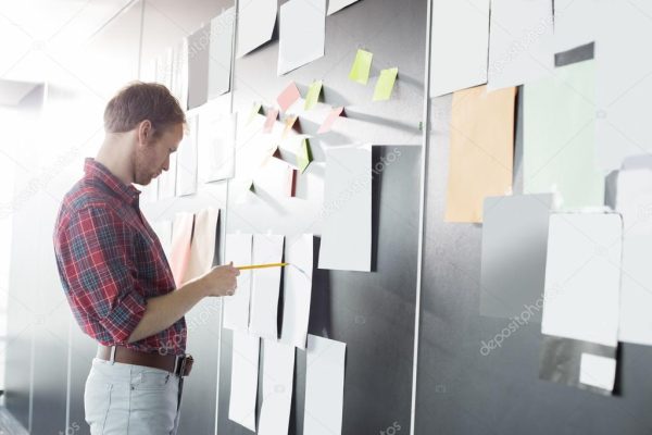 TEST-stock-photo-businessman-analyzing-documents TEST
